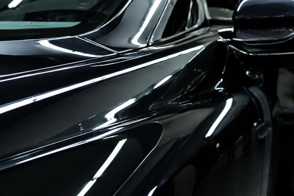 Corrected paint finish reflecting studio lighting (placeholder image)